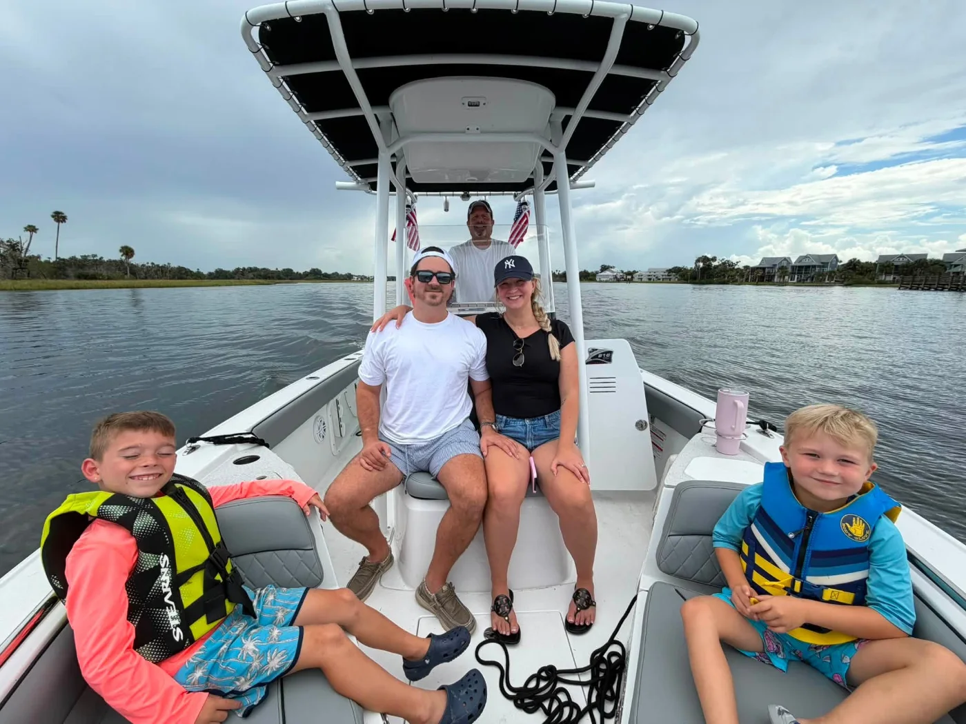 The DelBuco family on a boat on the water in Crystal River, Florida